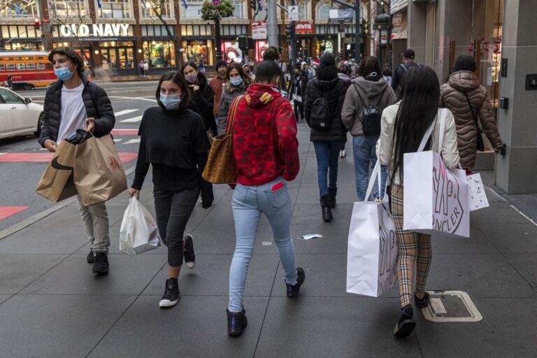 Early holiday shopping helps offset Omicron Damper